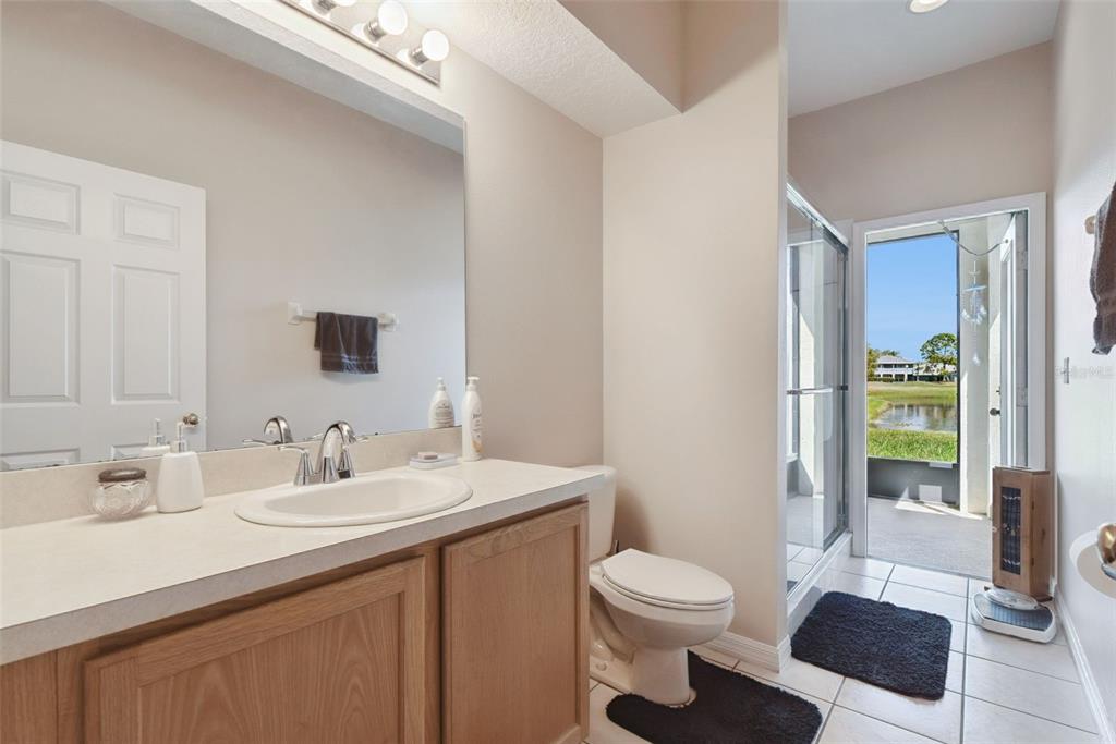 1209 Castleport Road Winter Garden, FL 34787 - Photo 22 of 36 a bathroom with a sink a toilet and shower