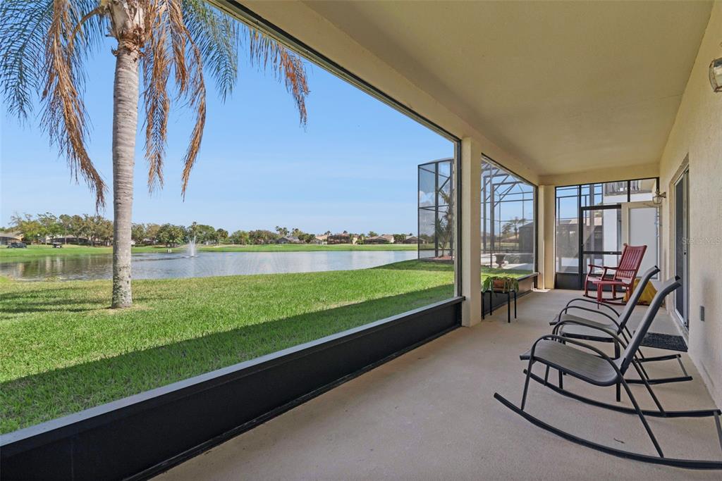 1209 Castleport Road Winter Garden, FL 34787 - Photo 24 of 36 a building view with a garden and outdoor seating