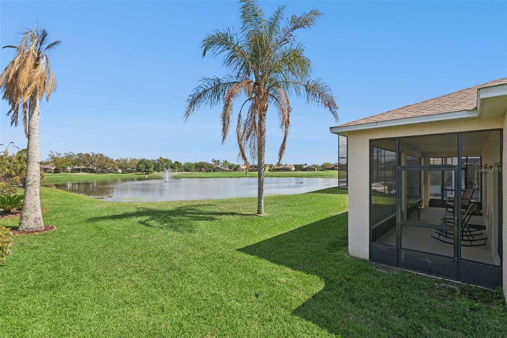 1209 Castleport Road Winter Garden, FL 34787 - Photo 25 of 36 a view of a house with a yard and a patio