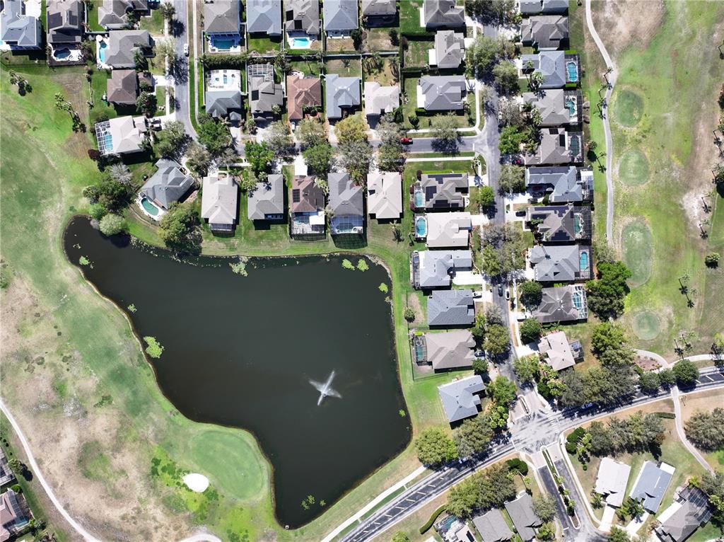1209 Castleport Road Winter Garden, FL 34787 - Photo 30 of 36 an aerial view of residential houses with outdoor space