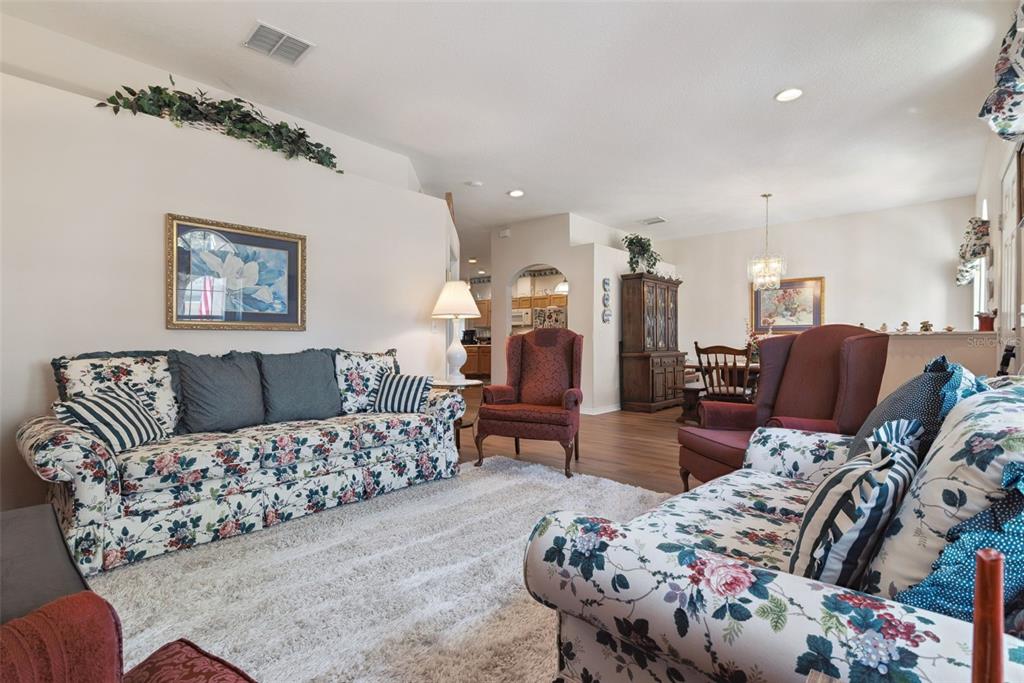 1209 Castleport Road Winter Garden, FL 34787 - Photo 9 of 36 a bed room with furniture and wooden floor