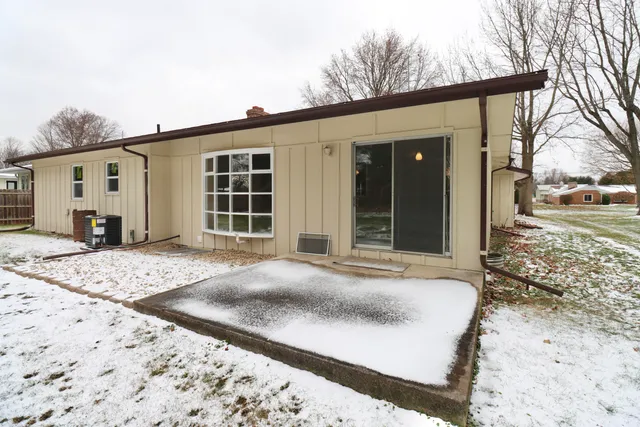 a view of a yard with trees