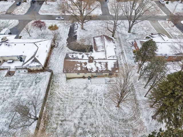 a view of storage and utility room with racks on the wall