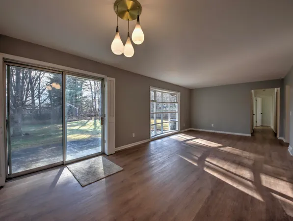 a view of a room and window