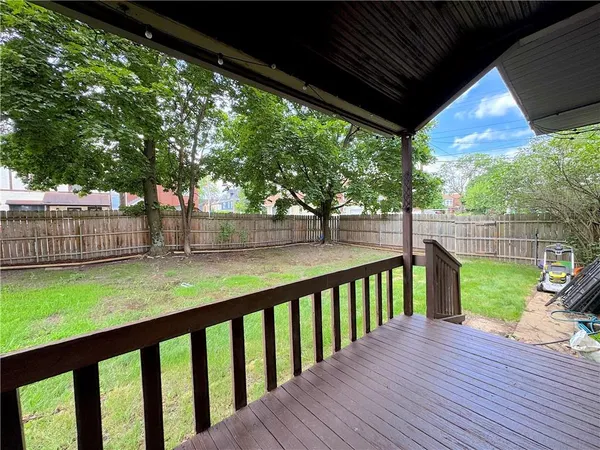 a view of backyard with green space