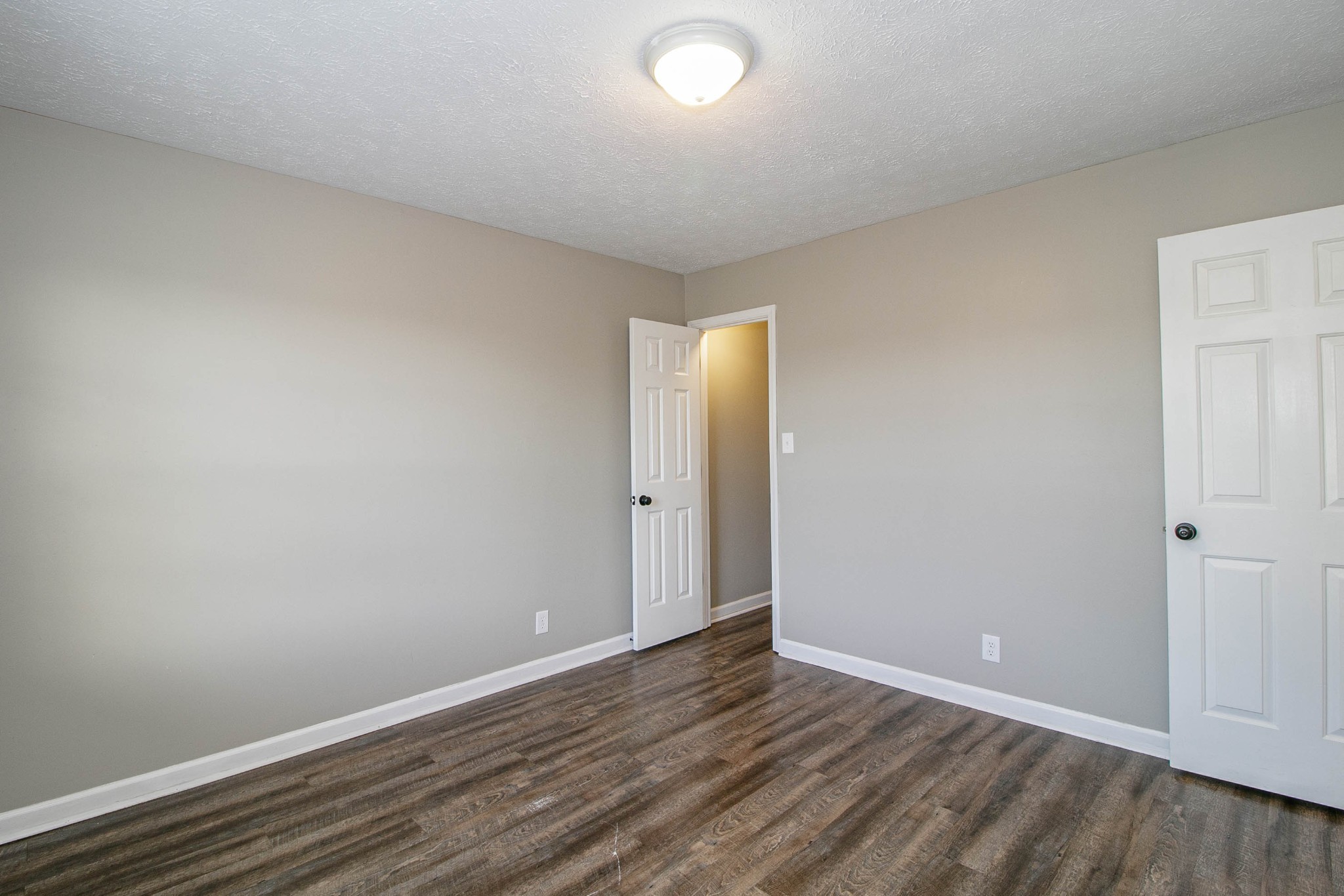 947 State Line Road Oak Grove, KY 42262 - Photo 19 of 25 a view of an empty room with wooden floor