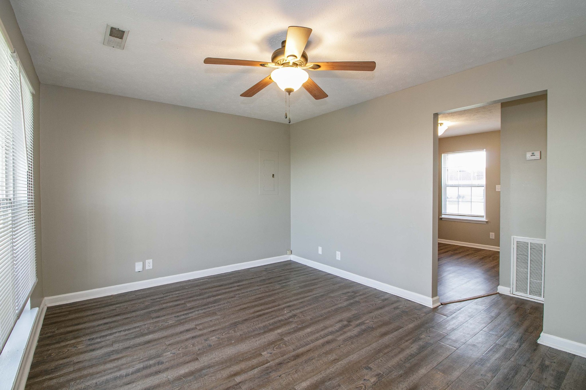 947 State Line Road Oak Grove, KY 42262 - Photo 2 of 25 wooden floor in an empty room with a window