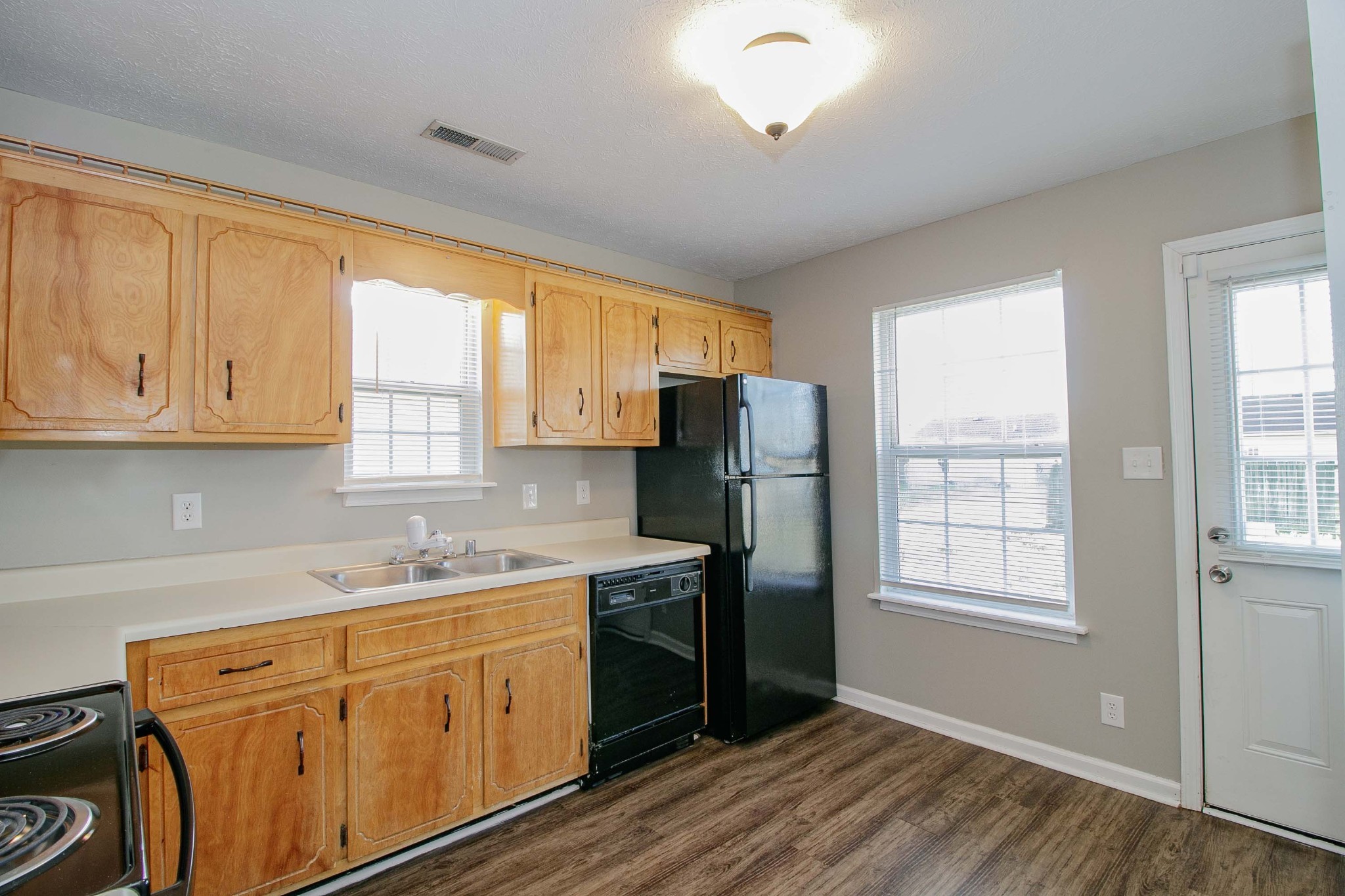 947 State Line Road Oak Grove, KY 42262 - Photo 6 of 25 a kitchen with stainless steel appliances granite countertop a refrigerator sink and cabinets