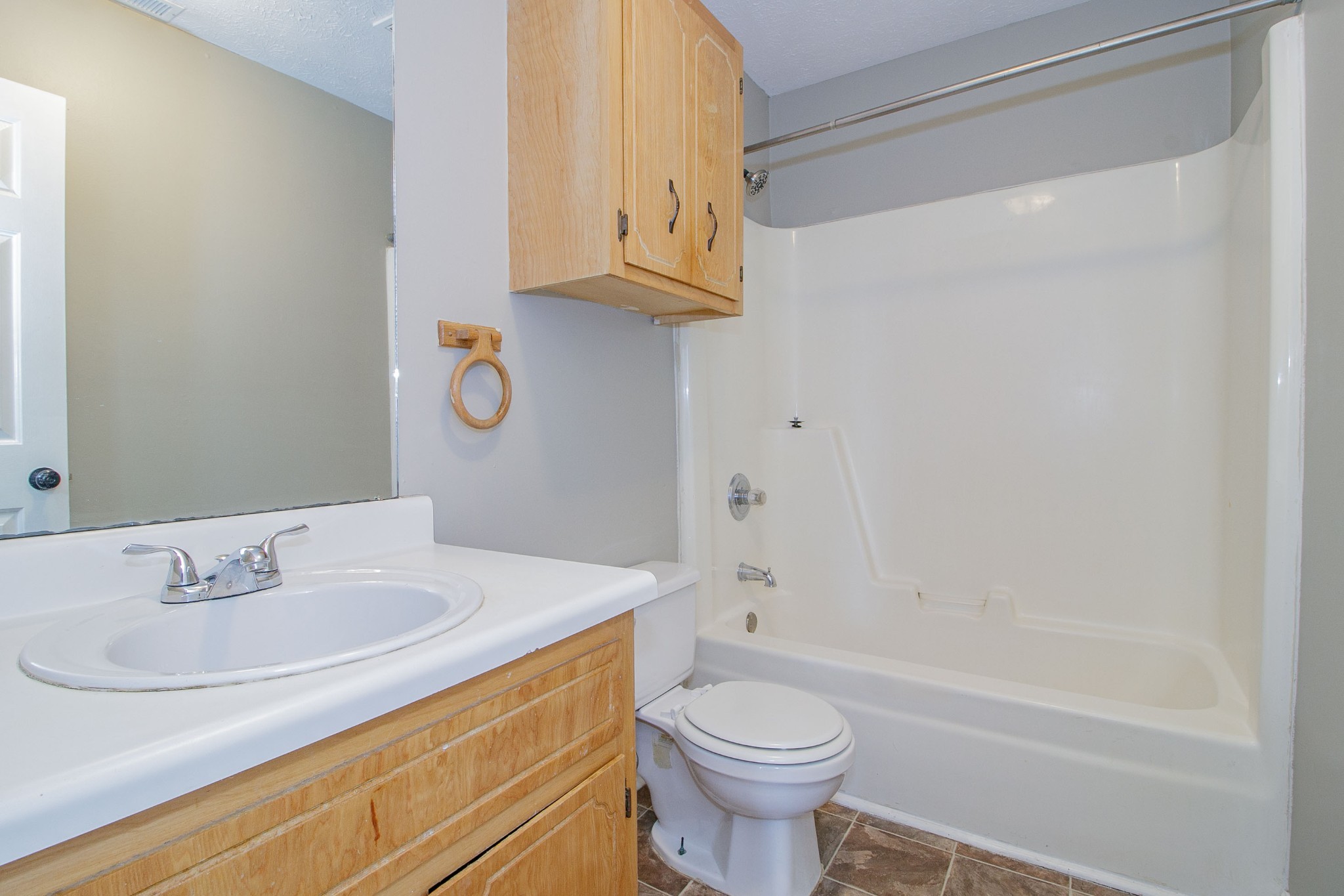 947 State Line Road Oak Grove, KY 42262 - Photo 10 of 25 a bathroom with a sink a toilet and bathtub