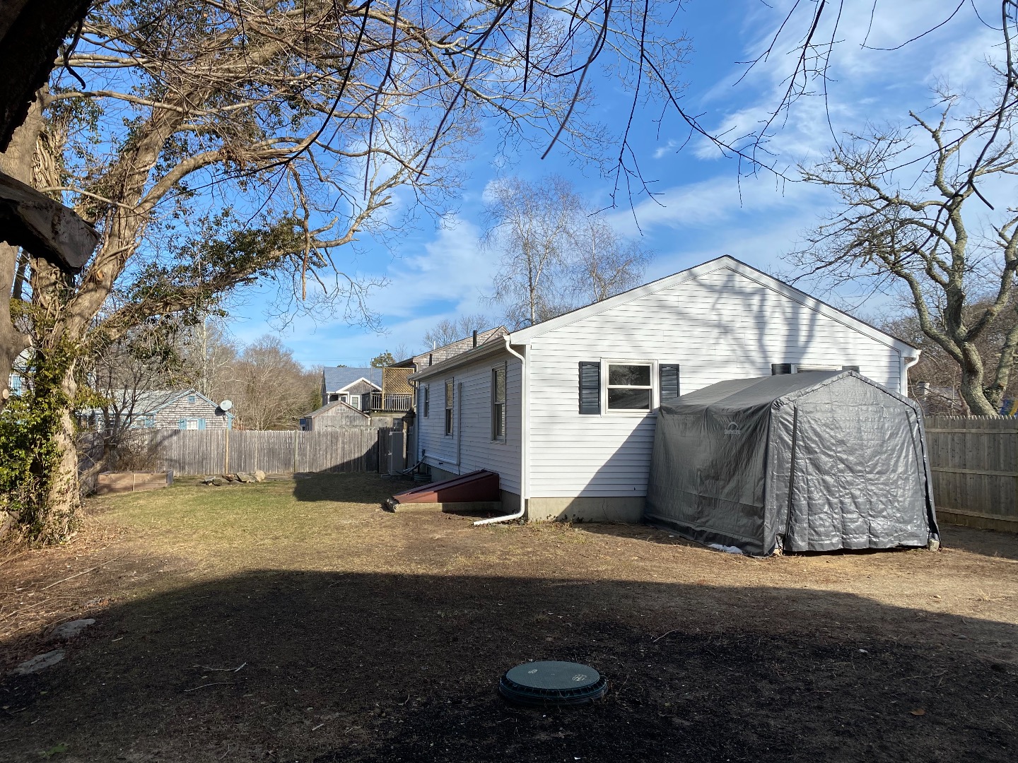 14 Rogers Farm Road Vineyard Haven, MA 02568 - Photo 12 of 12 a view of a house with a yard