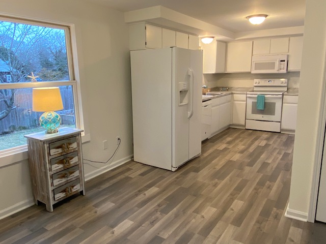14 Rogers Farm Road Vineyard Haven, MA 02568 - Photo 5 of 12 a kitchen with stainless steel appliances a refrigerator sink and cabinets