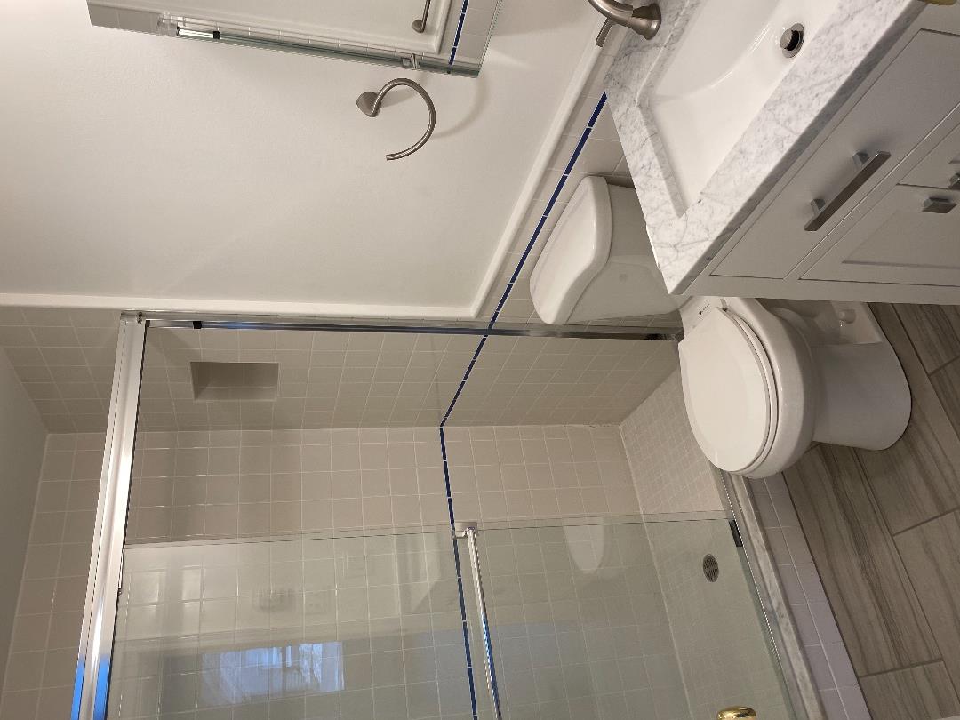 14 Rogers Farm Road Vineyard Haven, MA 02568 - Photo 6 of 12 a bathroom with a sink and a mirror