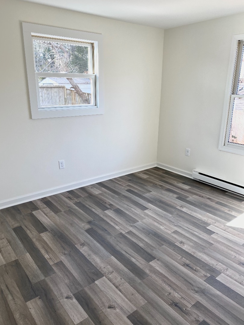 14 Rogers Farm Road Vineyard Haven, MA 02568 - Photo 10 of 12 a view of room with window and hardwood floor