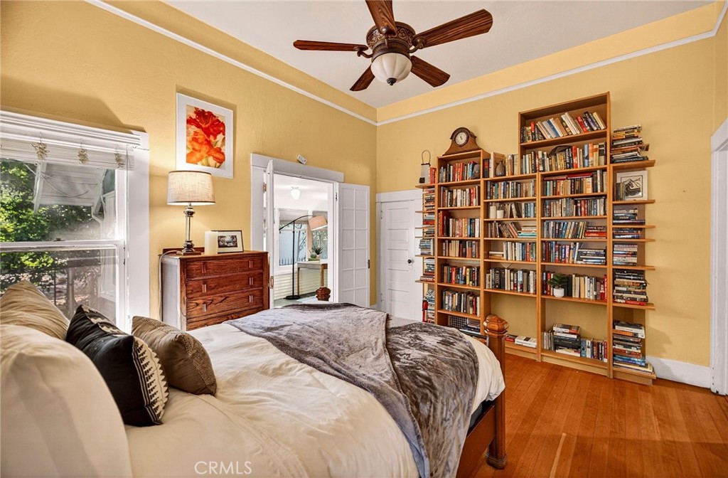 1050 Esplanade Chico, CA 95926 - Photo 22 of 42 a bed room with a bed and a book shelf