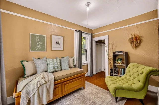 a bedroom with furniture and a couch