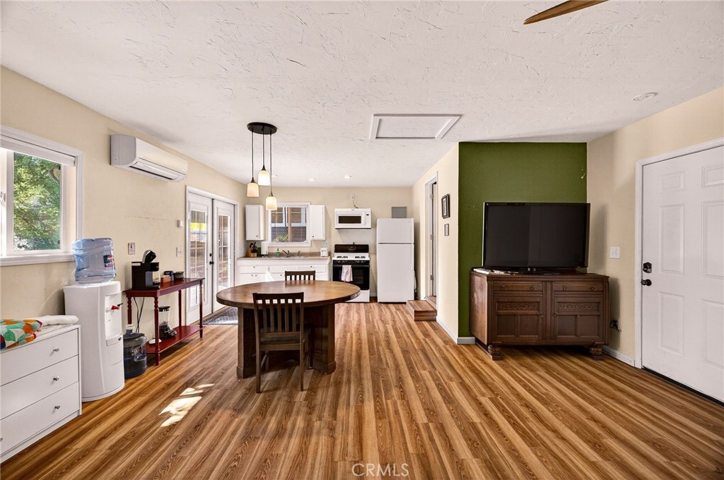 1050 Esplanade Chico, CA 95926 - Photo 34 of 42 a living room with furniture and a flat screen tv