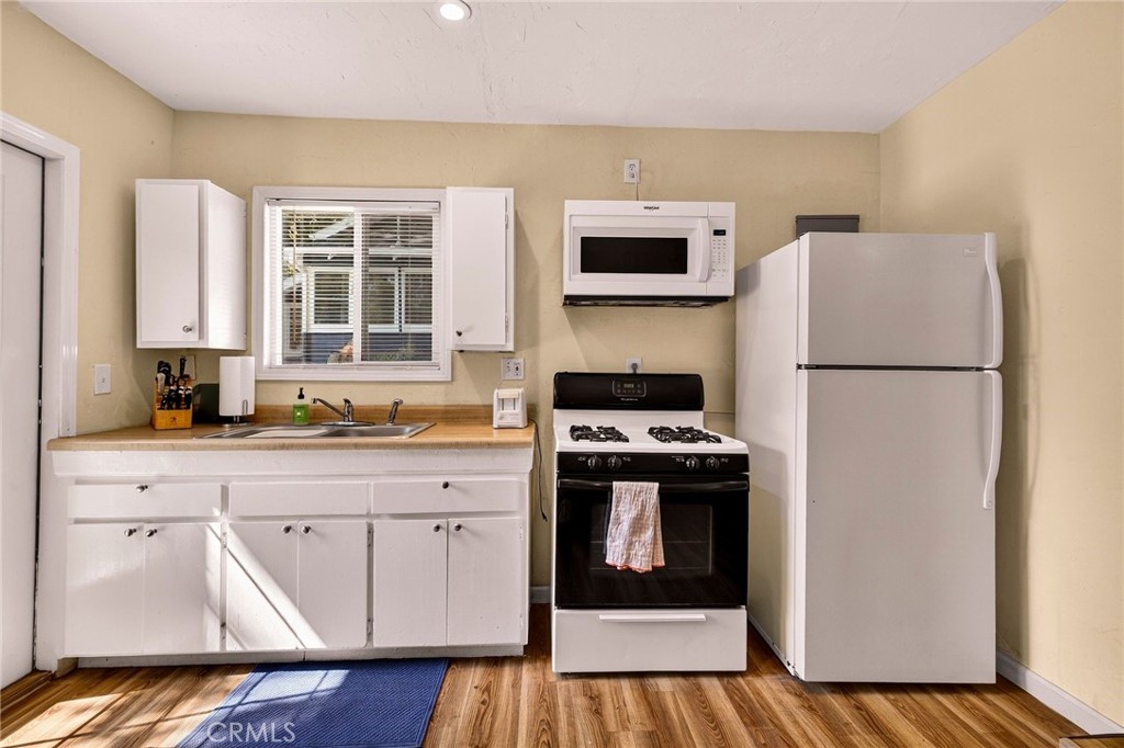 1050 Esplanade Chico, CA 95926 - Photo 36 of 42 a kitchen with stainless steel appliances a refrigerator stove and sink
