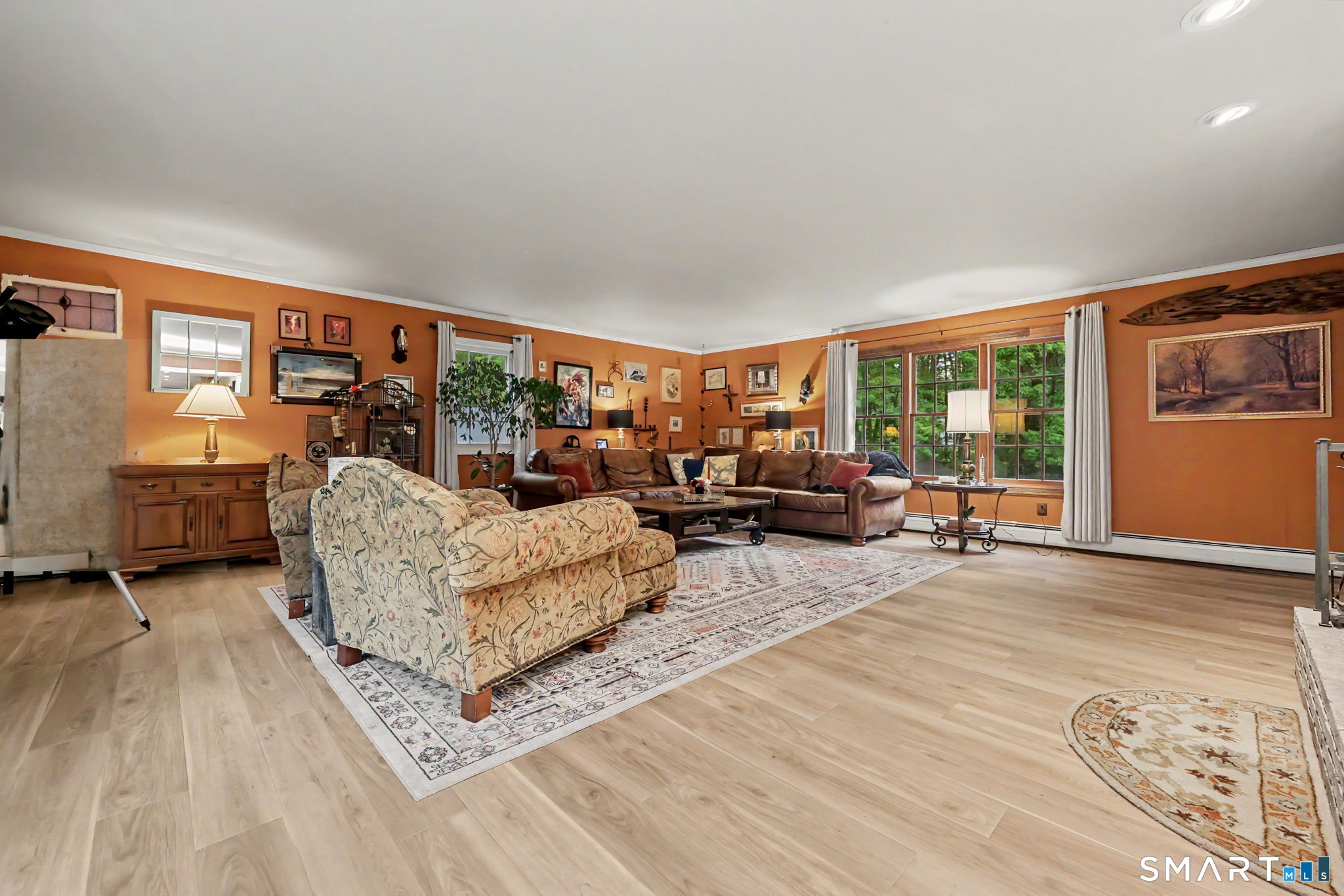 571 Wheeler Road Monroe, CT 06468 - Photo 16 of 40 a living room with furniture and a large window