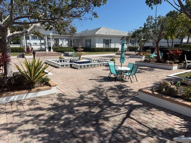 6750 Northeast 21st Road, Unit 123 Fort Lauderdale, FL 33308 - Photo 56 of 60 Garden Area Outside of Building 1