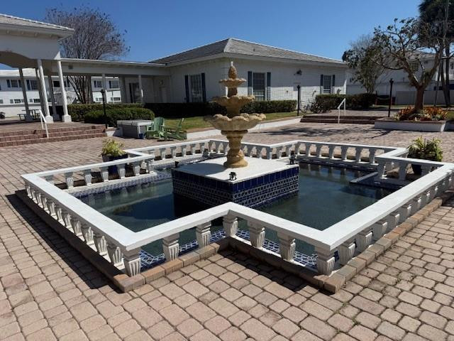 6750 Northeast 21st Road, Unit 123 Fort Lauderdale, FL 33308 - Photo 57 of 60 Garden Area Outside of Building 1