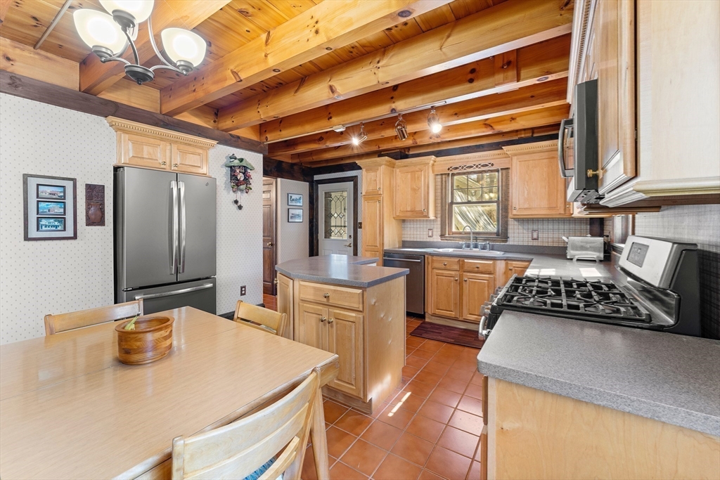 55 Boyles Street Beverly, MA 01915 - Photo 13 of 30 a kitchen that has a sink and a stove top oven