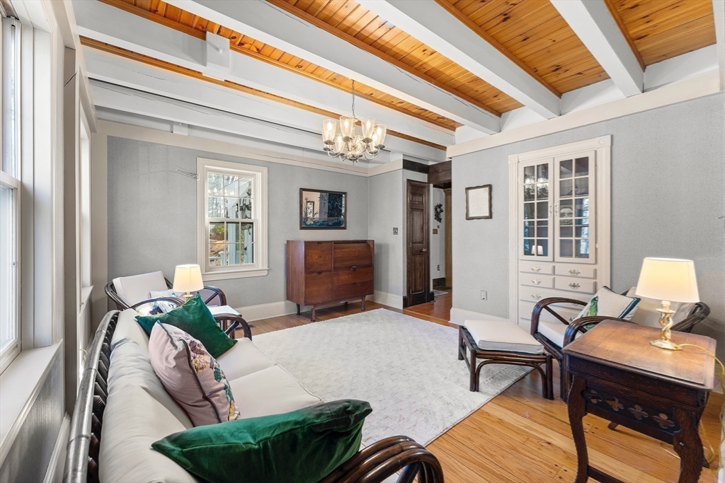 55 Boyles Street Beverly, MA 01915 - Photo 16 of 30 a living room with furniture and a fireplace