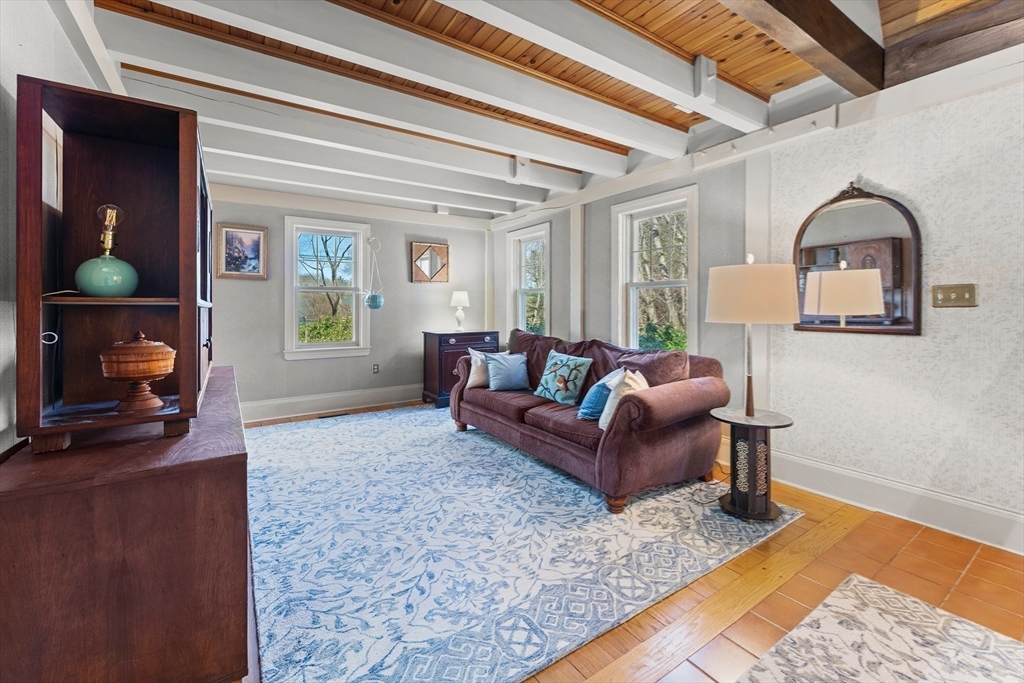 55 Boyles Street Beverly, MA 01915 - Photo 17 of 30 a living room with furniture and a window