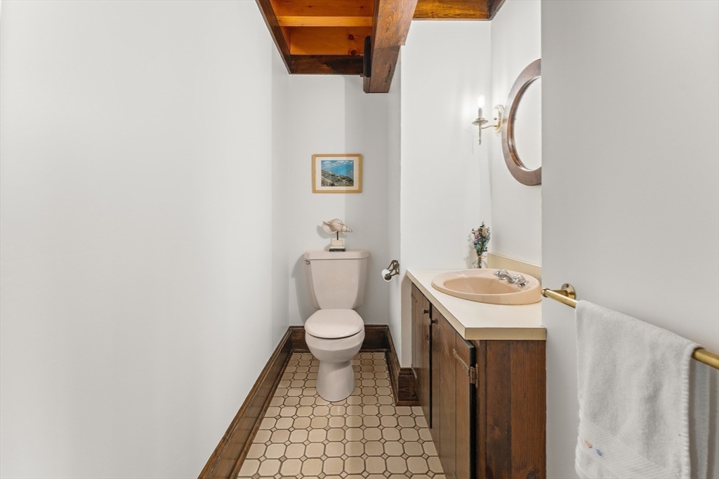 55 Boyles Street Beverly, MA 01915 - Photo 26 of 30 a bathroom with a sink and a toilet