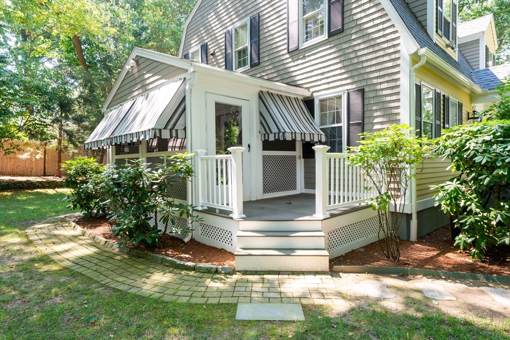 55 Boyles Street Beverly, MA 01915 - Photo 29 of 30 a view of house with backyard and sitting area