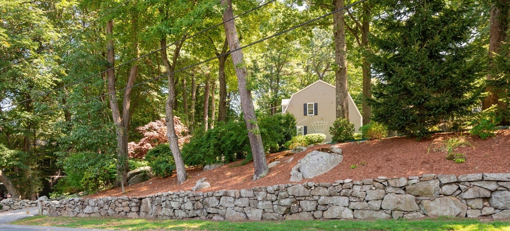 55 Boyles Street Beverly, MA 01915 - Photo 3 of 30 a front view of a house with garden