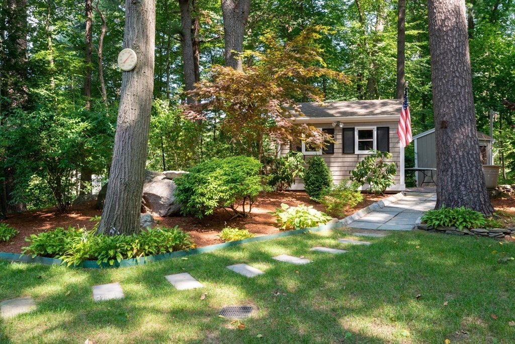 55 Boyles Street Beverly, MA 01915 - Photo 6 of 30 a front view of a house with garden