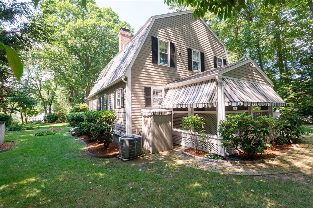 55 Boyles Street Beverly, MA 01915 - Photo 8 of 30 a front view of a house with garden