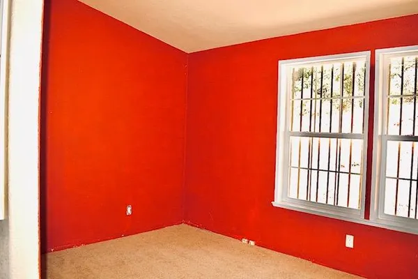 a view of a bedroom with a window