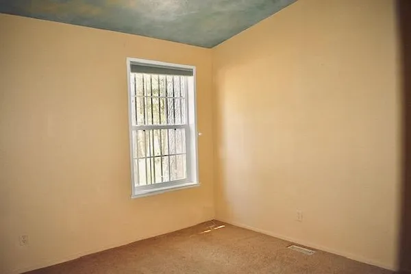 an empty room with windows