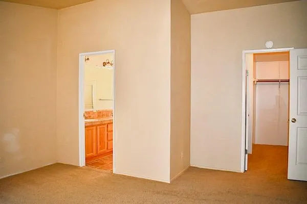 a bathroom with a sink double vanity and a mirror