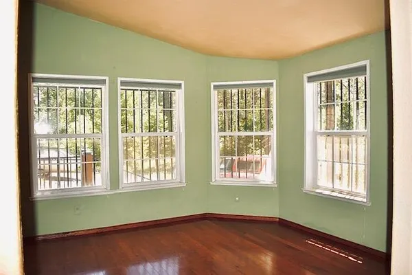a view of a room with windows
