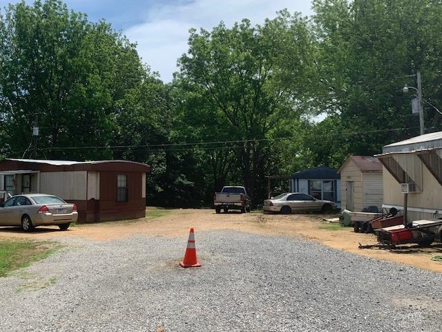 1585 Asbury Glimp Road Ripley, TN 38063 - Photo 8 of 11 a view of street with parked cars