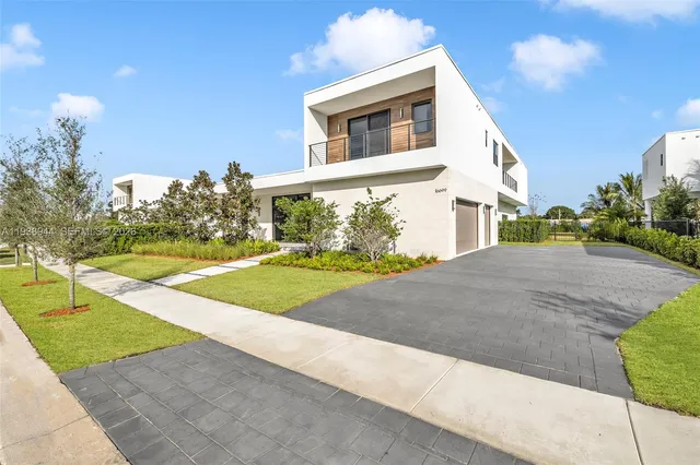 a spacious bathroom with a tub and shower