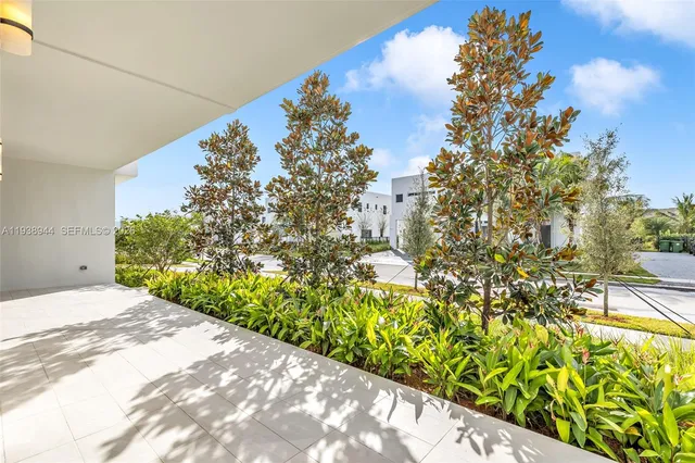 a bathroom with a toilet sink and shower