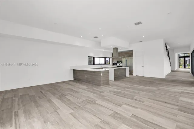 a view of swimming pool from a balcony