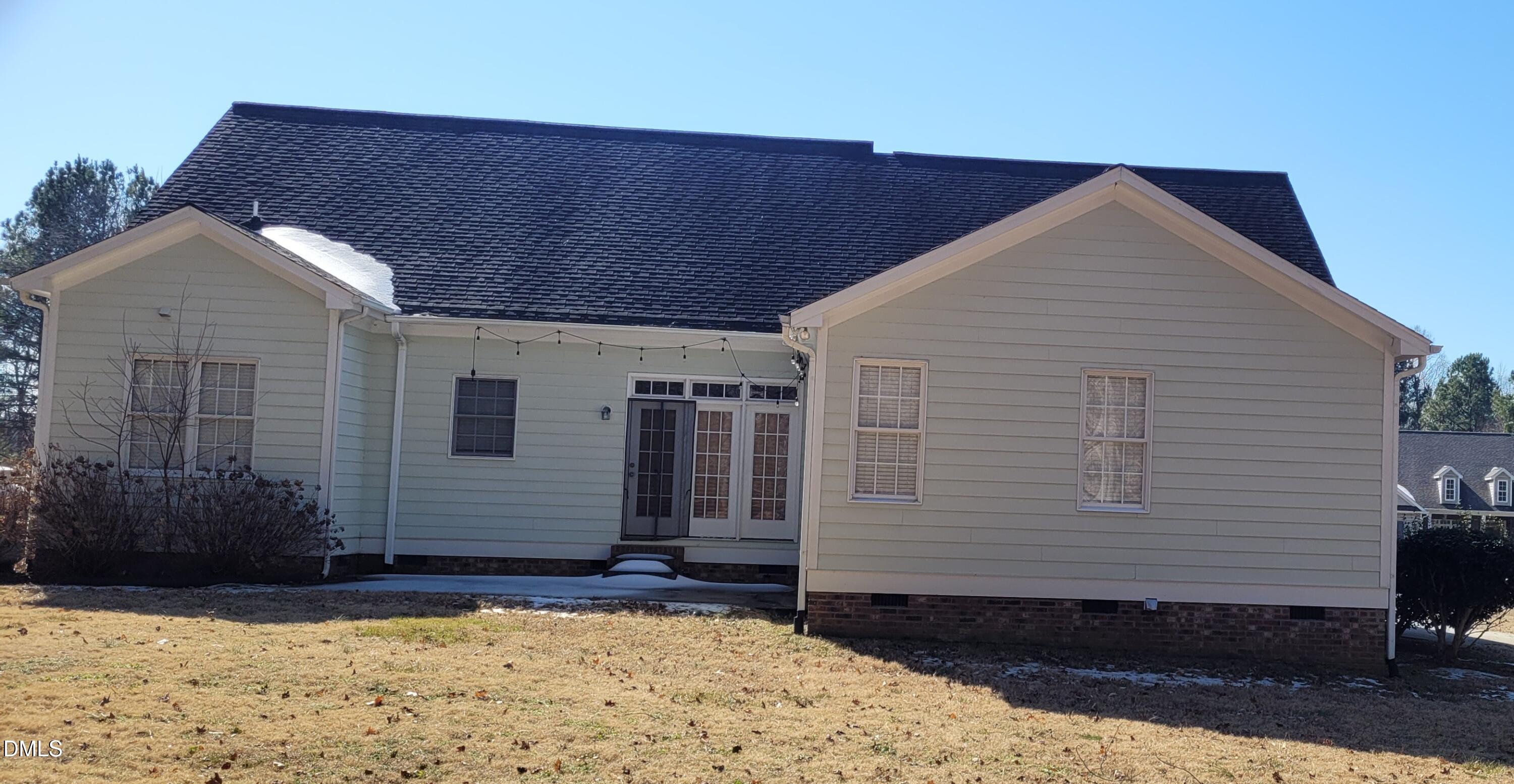226 Fletcher Ridge Road Timberlake, NC 27583 - Photo 26 of 30 a view of a house with a yard