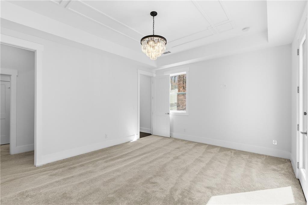 15448 Hopewell Road Milton, GA 30004 - Photo 34 of 125 a view of an empty room with a window