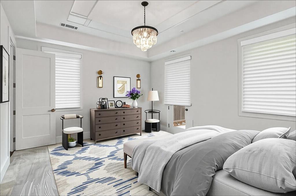 15448 Hopewell Road Milton, GA 30004 - Photo 35 of 125 a bedroom with a bed and a chandelier