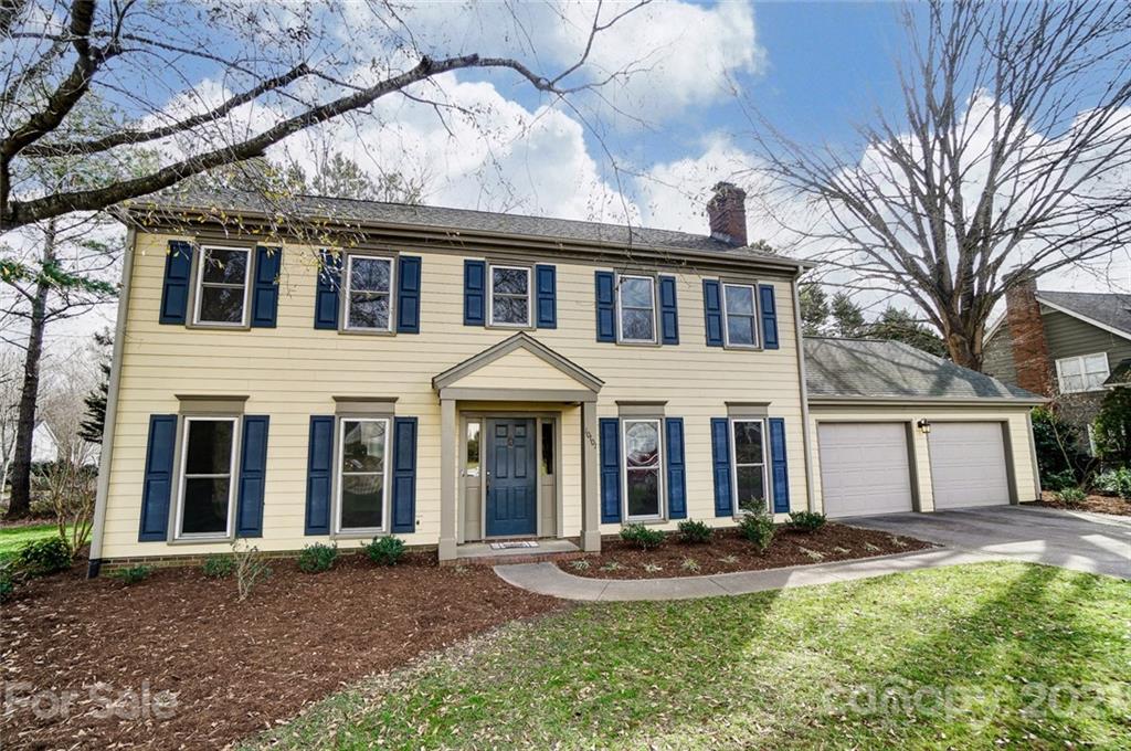 10101 Deer Spring Lane Charlotte, NC 28210 - Photo 2 of 45 a front view of a house with yard and porch