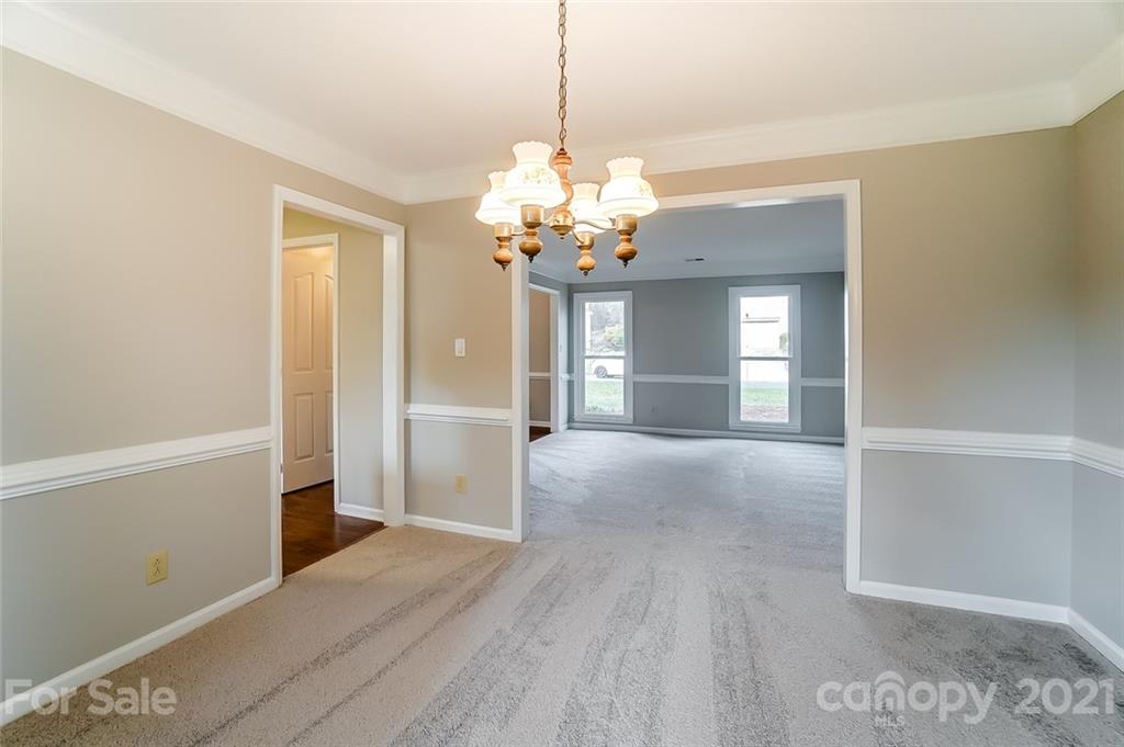 10101 Deer Spring Lane Charlotte, NC 28210 - Photo 11 of 45 a view of a room with wooden floor and staircase