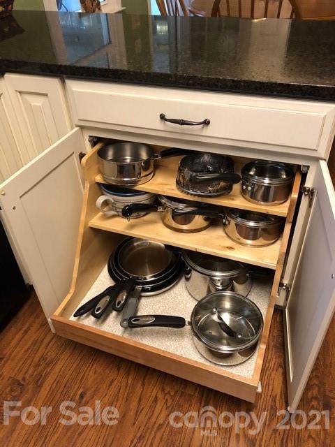 10101 Deer Spring Lane Charlotte, NC 28210 - Photo 14 of 45 a stove top oven sitting inside of a kitchen