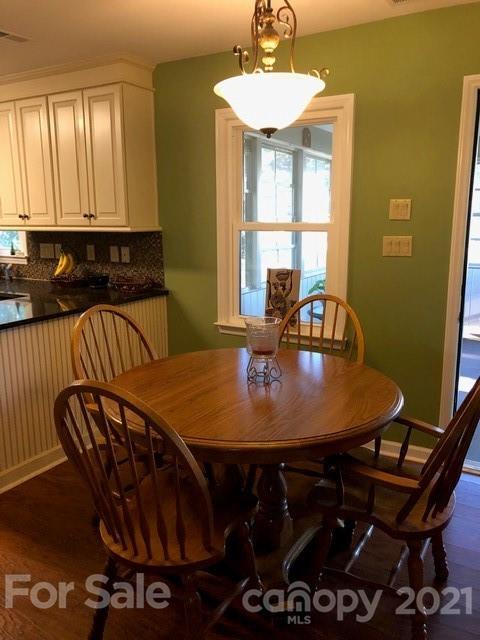 10101 Deer Spring Lane Charlotte, NC 28210 - Photo 19 of 45 a view of a dining room with furniture and window