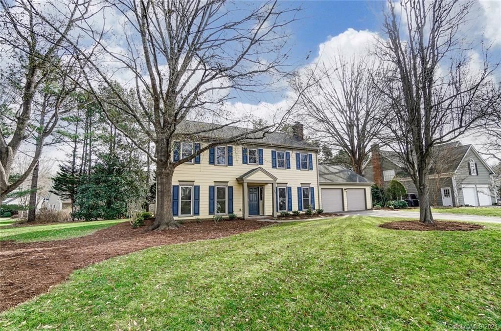 10101 Deer Spring Lane Charlotte, NC 28210 - Photo 3 of 45 a front view of a building with a yard