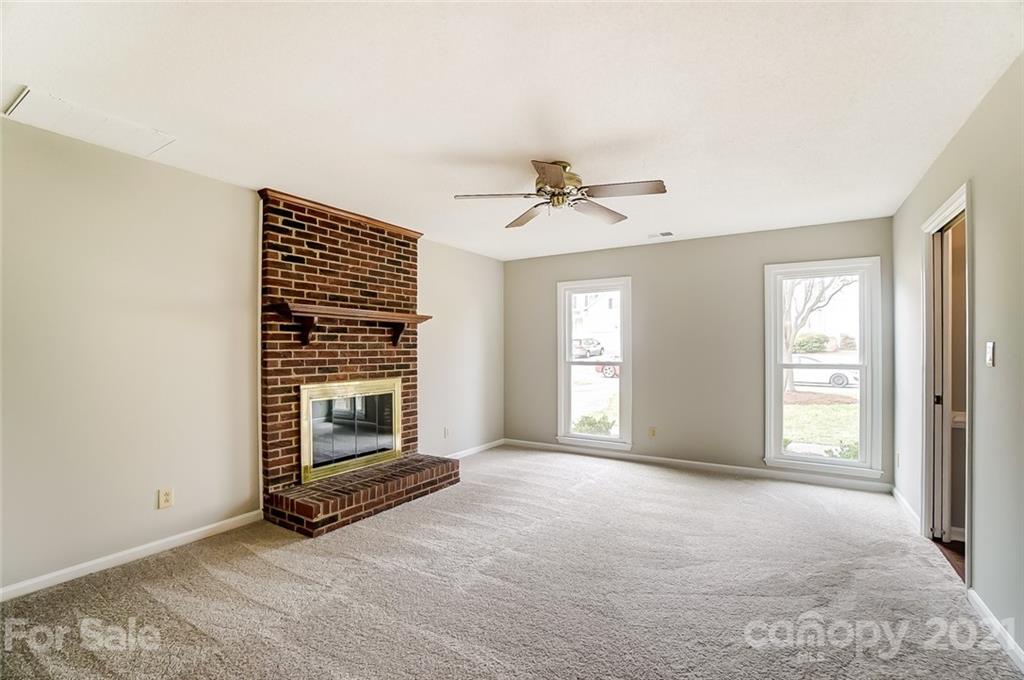 10101 Deer Spring Lane Charlotte, NC 28210 - Photo 21 of 45 a view of livingroom with furniture fireplace and window