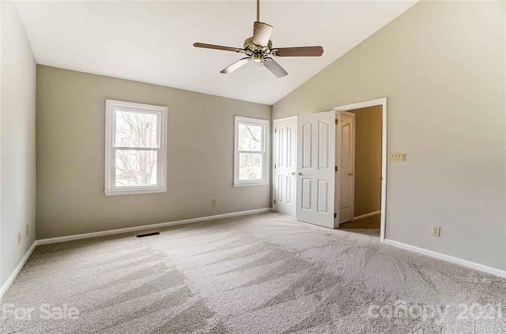 10101 Deer Spring Lane Charlotte, NC 28210 - Photo 25 of 45 a view of an empty room with a window